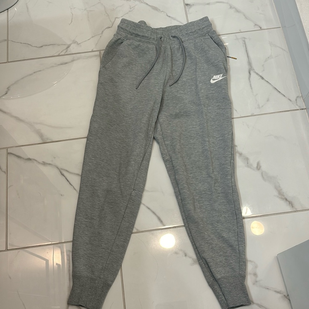 Grey Nike sweatpants